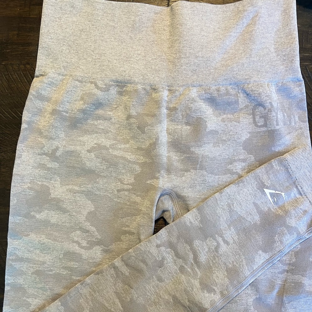Like new gray camo Gymshark leggings. Worn once, size small.